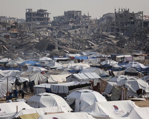Displaced Palestinians living in makeshift tents in Gaza City’s Zeitoun neighbourhood