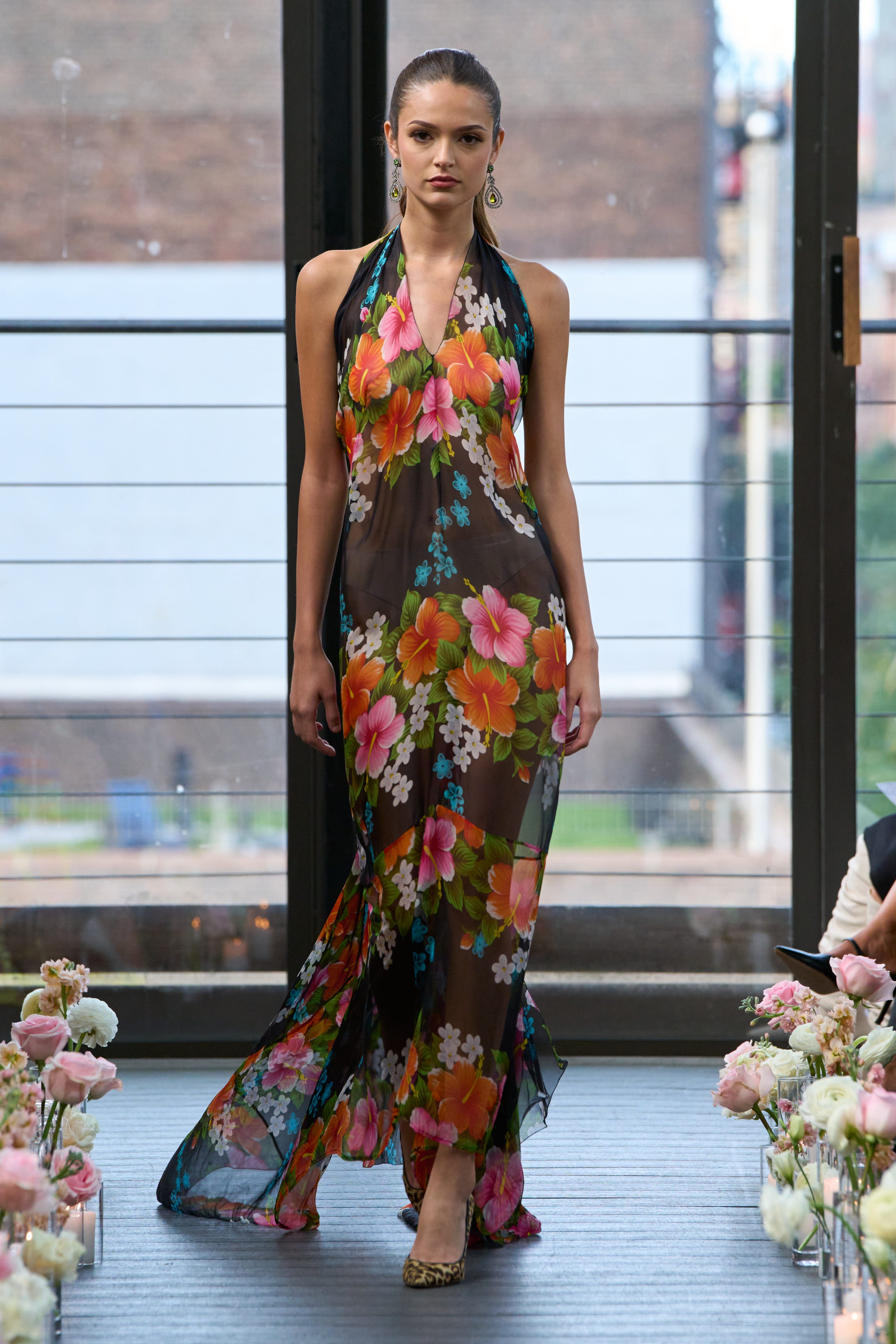 dress made on runway A model wearing a dress made from chocolate seen walking on the runway at  the Salon du Chocolat. These carefully designed garments have been  painstaking put together by top Chocolatiers working with