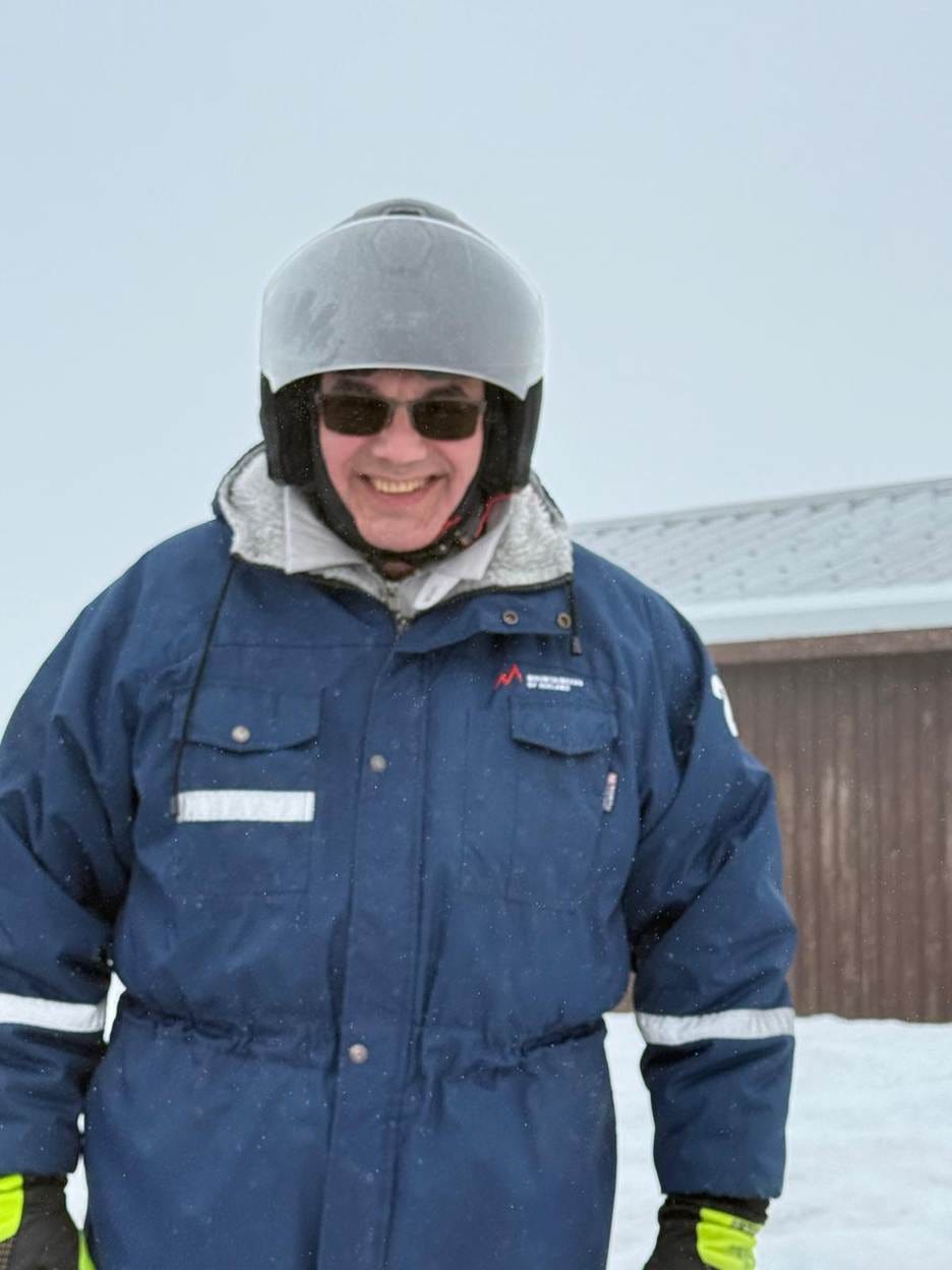A person wearing a helmet and a blue jacket

AI-generated content may be incorrect.