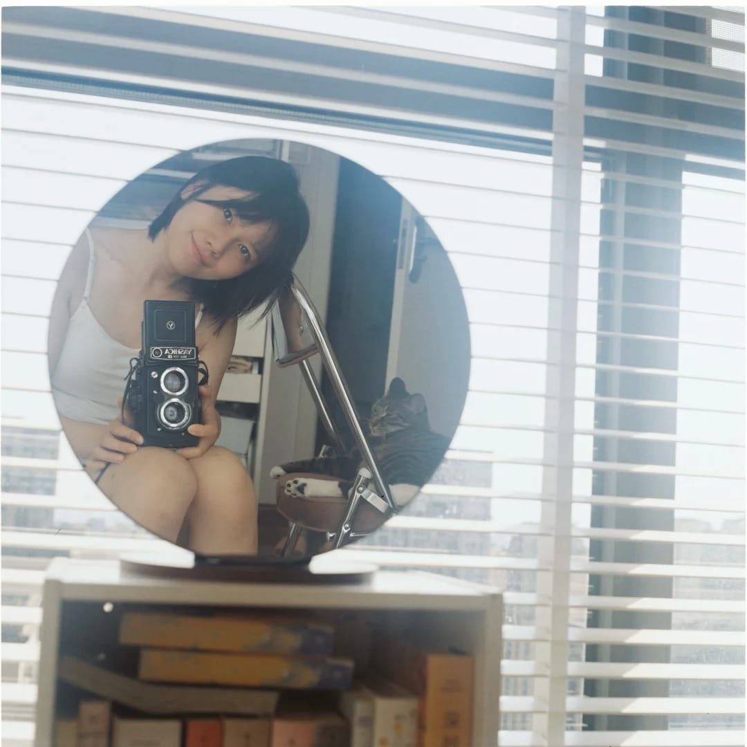 她和她的胶片相机