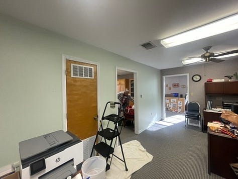 Six photos of the green walls in the office before we got to work painting..