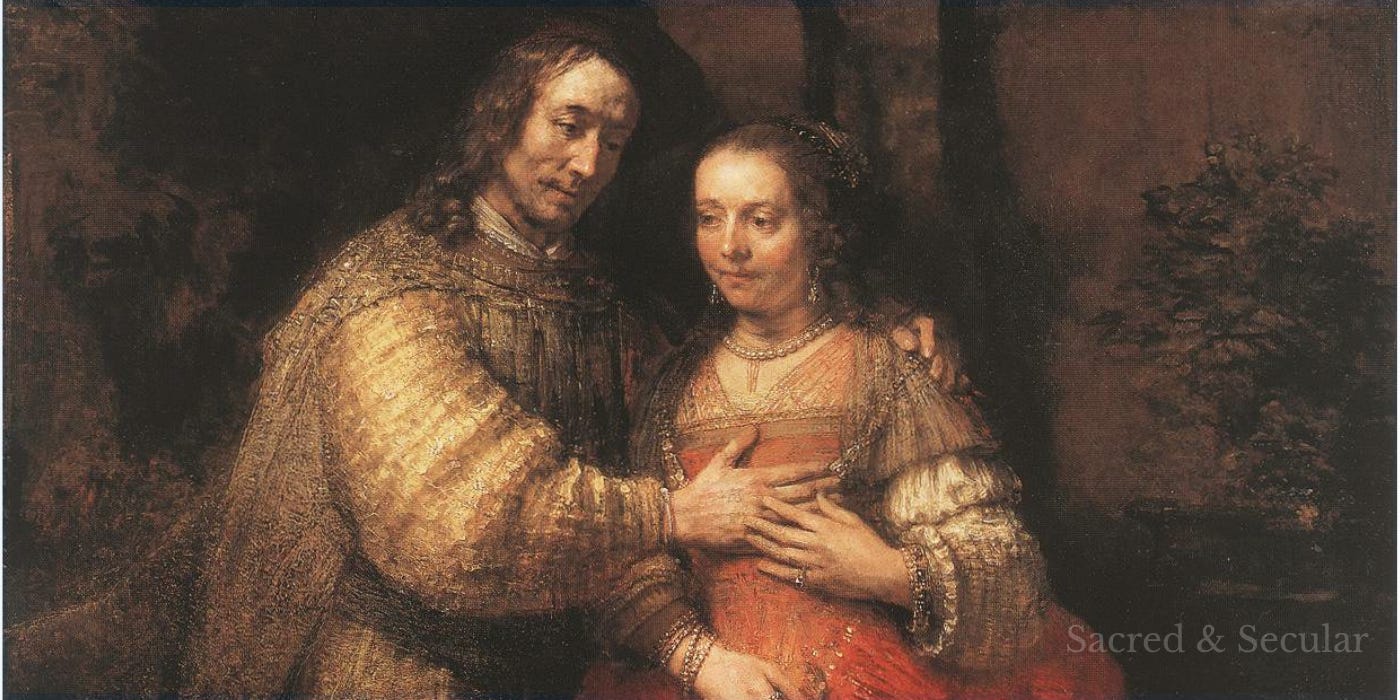 Rembrandt painting of a richly dressed man and woman standing closely together, his arm resting gently around her shoulders and his hand placed over hers. Their expressions are quiet and intimate, with warm light drawing attention to their faces and joined hands against a dark background. Rembrandt painting of a richly dressed man and woman standing closely together, his arm resting gently around her shoulders and his hand placed over hers. Their expressions are quiet and intimate, with warm light drawing attention to their faces and joined hands against a dark background.