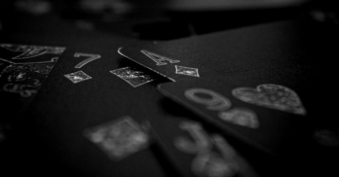 a close up of playing cards with numbers on them