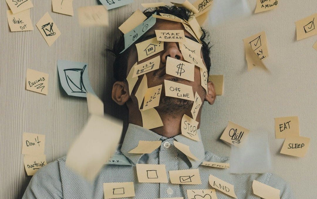 people sitting on chair with brown wooden table people sitting on chair with brown wooden table