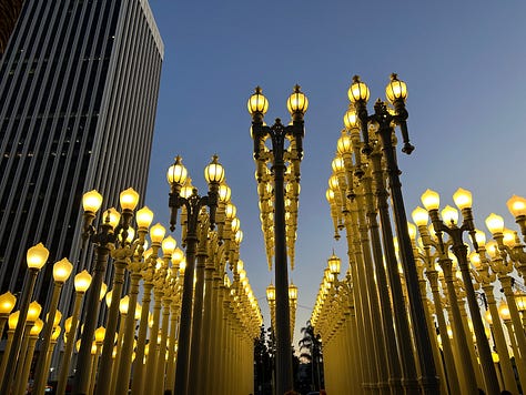 Urban Lights outside of LACMA, including photos with Hannah in front of them.