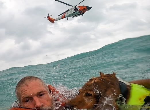 Dramatic Video of Coast Guard Rescuing Man and Dog