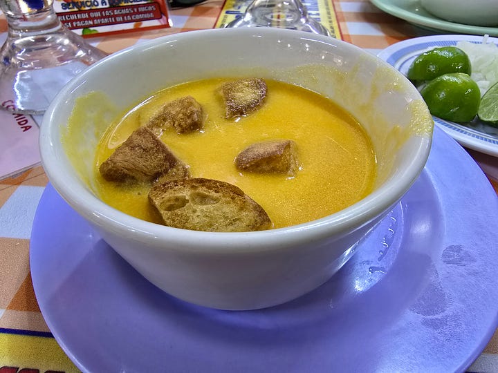 Watermelon agua fresca, cream soup, rice with egg, mole with chicken