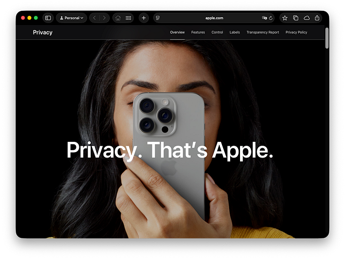 Apple privacy homepage showing iPhone covering user face with slogan “Privacy. That’s Apple.”