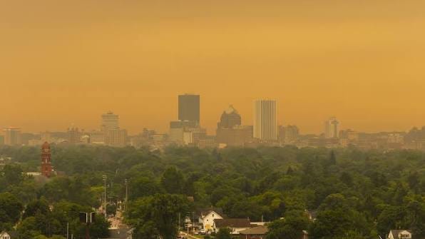 A hazy day over Rochester. Wildfire smoke moving through the region has  created today's unique skyline views — a reminder to check air quality  conditions and take care when spending time outdoors. #