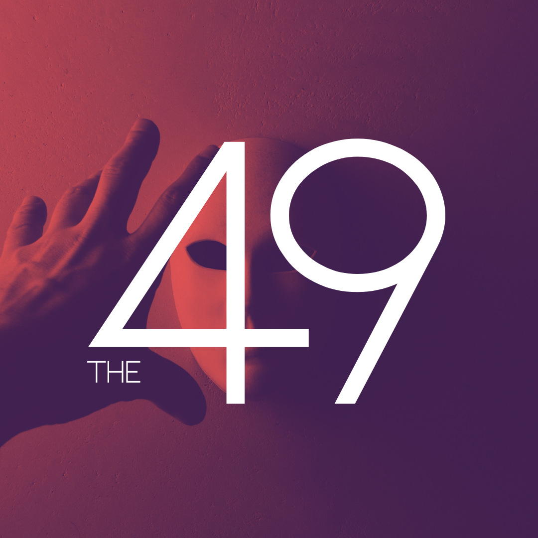 A man reaches for a mask that lies on the floor - The 49 by Andrew Kooman