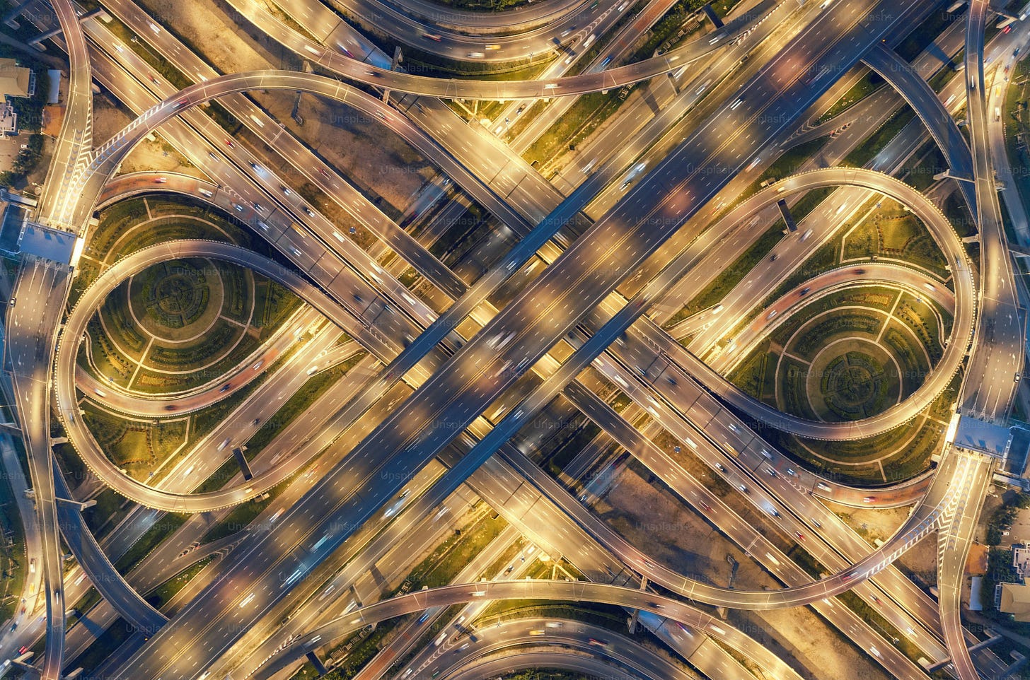 Aerial view highway road intersection for transportation or traffic background. Aerial view highway road intersection for transportation or traffic background.