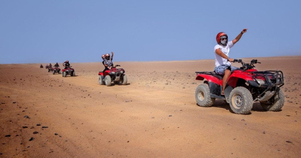 quad biking in the desert