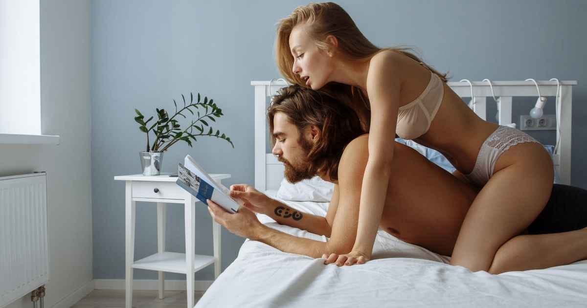 couple reading a book in bed