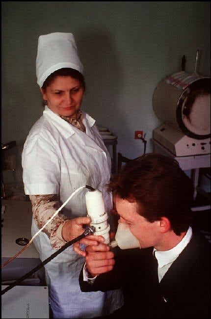 A miner undergoing testing for bronchitis and lung contamination. A miner undergoing testing for bronchitis and lung contamination.