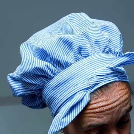 hair bonnet for sleeping on a women’s head top view, knot at the front hair bonnet for sleeping on a women’s head top view, knot at the front