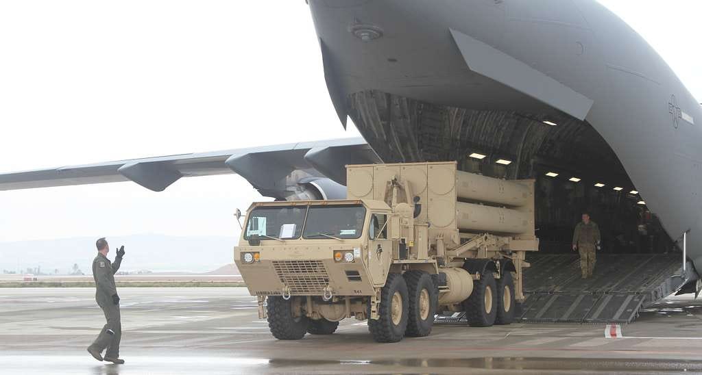 A U.S. Air Force Airmen offloads a THAAD launcher from — NARA and DVIDS  Public Domain Archives