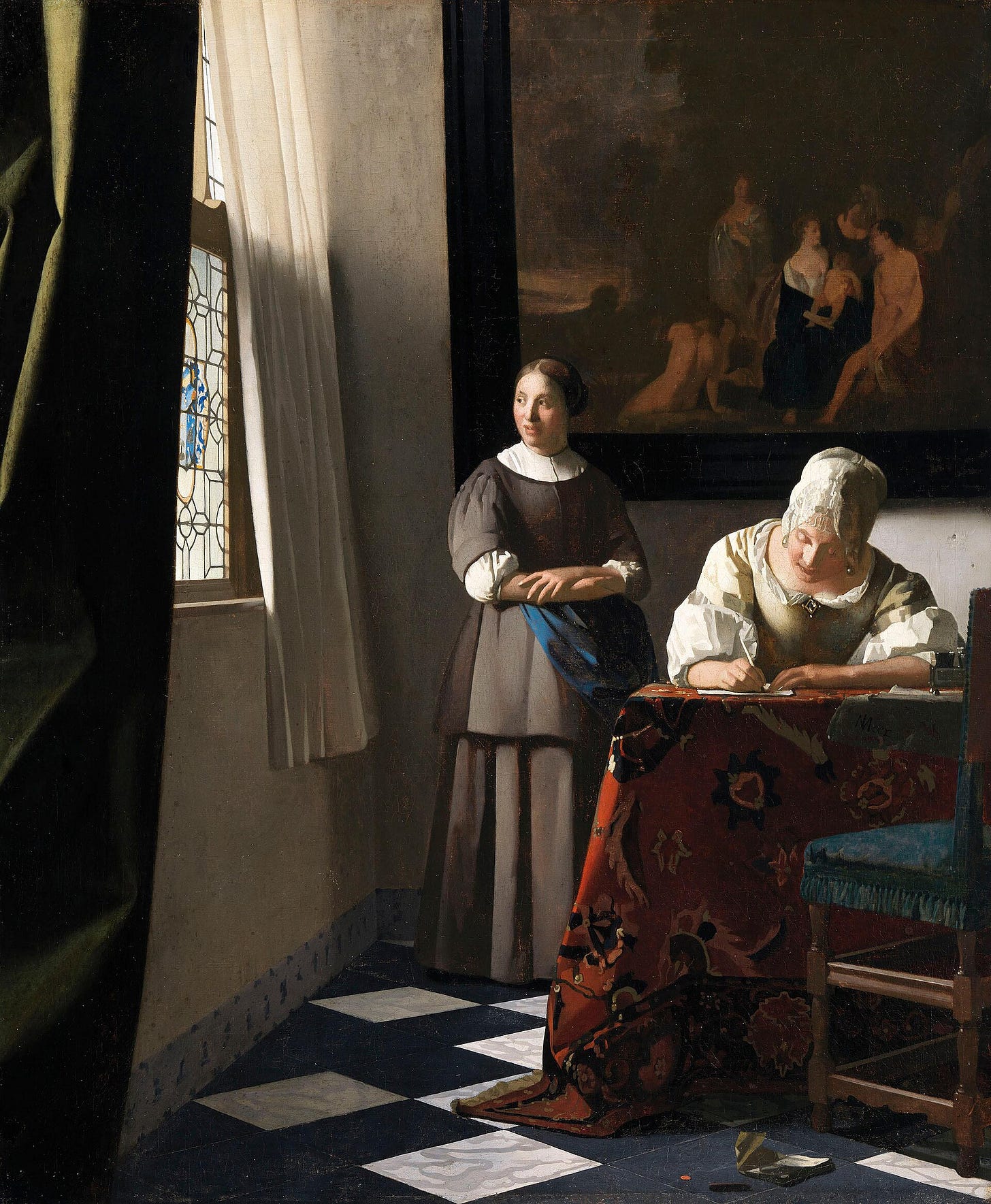 A woman in a yellow jacket writes at a table covered with a red carpet while her maid, in a grey dress, stands behind her and looks out of a leaded window, under a large dark painting on the wall.