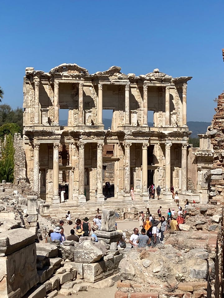 Various texts on scrolls or carved into stones plus the Library at Celcus