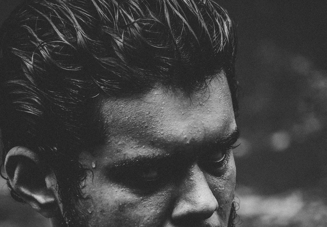 a black and white photo of a man