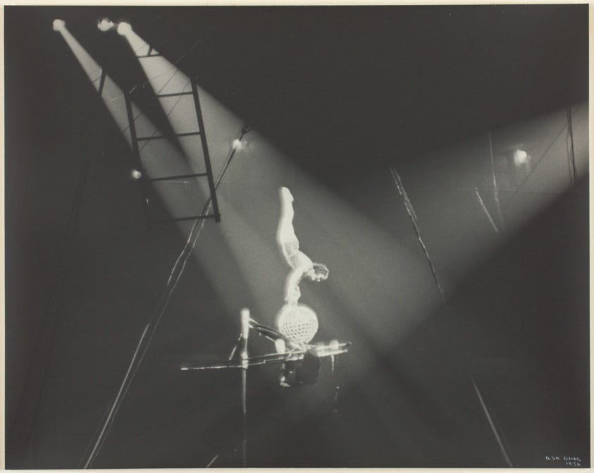 Antique B&W photo of acrobat balancing on a ball (chiasmus spices up your prose)