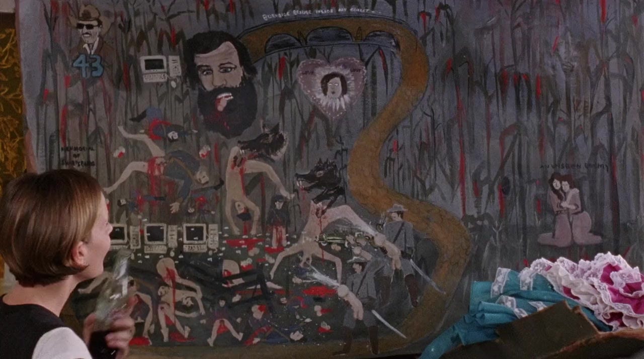 Madeline studies one of Wark's paintings, which depicts floating computers alongside combatants in the Battle of Antietam, menstruating corpses, and stock car driver Richard Petty.