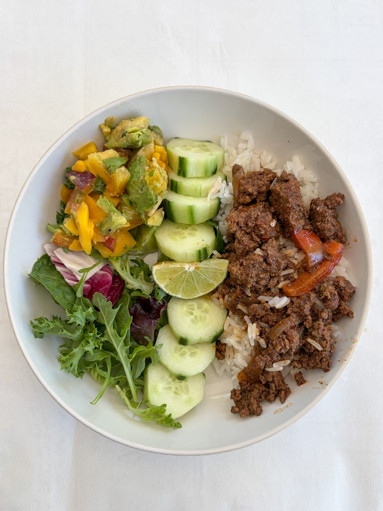 Summer taco bowl with peach mango salsa