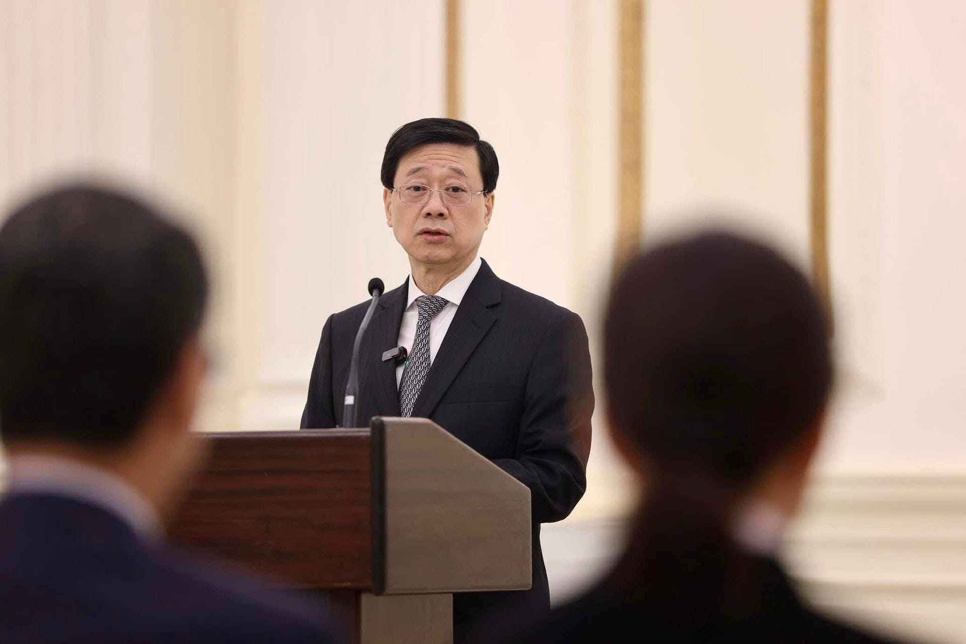Chief Executive John Lee Ka-chiu speaks to the city’s taikonaut candidates in June 2023.
