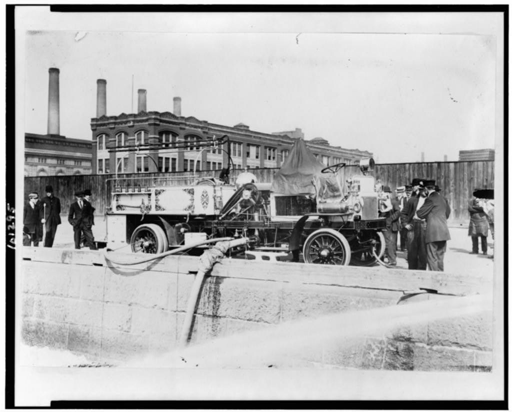 From Library of Congress: "Fire engine with initials FDNY, being filled with water, spectators standing by." c. 1911 From Library of Congress: "Fire engine with initials FDNY, being filled with water, spectators standing by." c. 1911