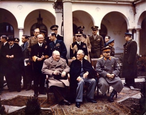 https://history.blog.gov.uk/wp-content/uploads/sites/2/2015/02/INF14-447-Yalta-conference-Churchill-Stalin-Roosevelt-1945-e1422986594341.jpg
