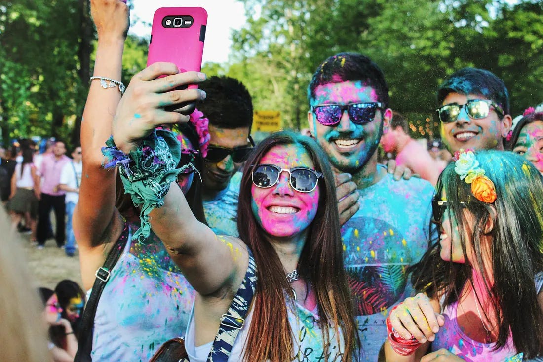 group of people taking a selfie