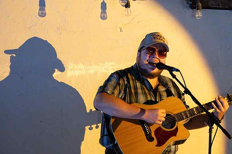 Clint Vines, Colton Sanders, and Jay Burnam perform in the loft at Iron Society, July 25th, 2025