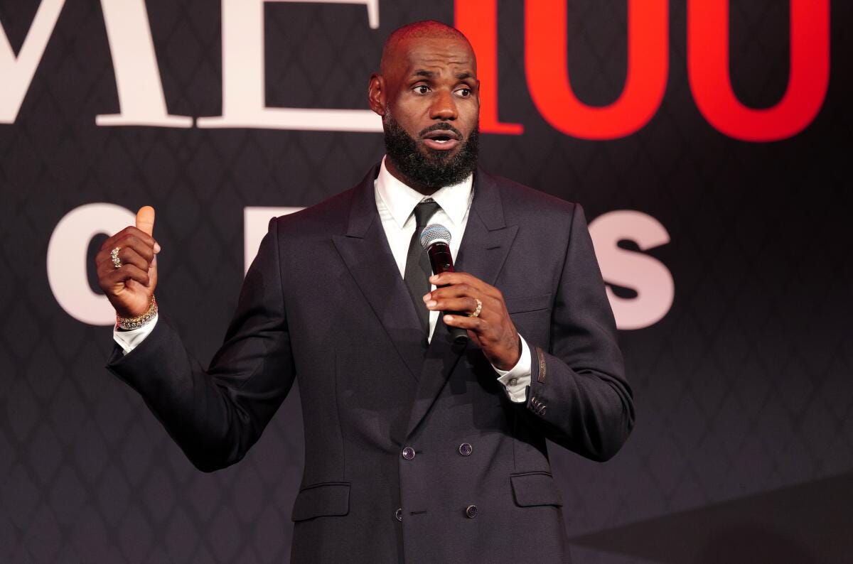 LeBron James speaks onstage during the TIME100 Sports Gala