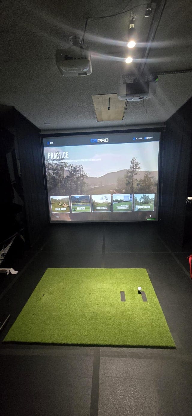 r/Golfsimulator - Surprised hubby with DIY retractable garage sim