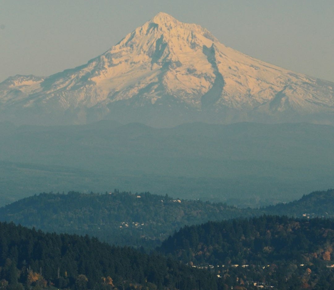 snow covered mountain during daytime