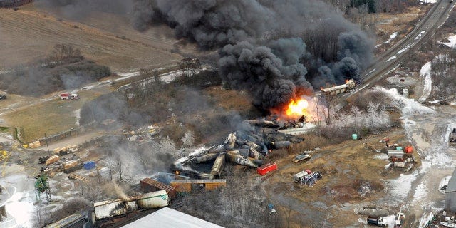 This photo taken with a drone shows portions of a Norfolk Southern freight train that derailed in eastern Ohio.