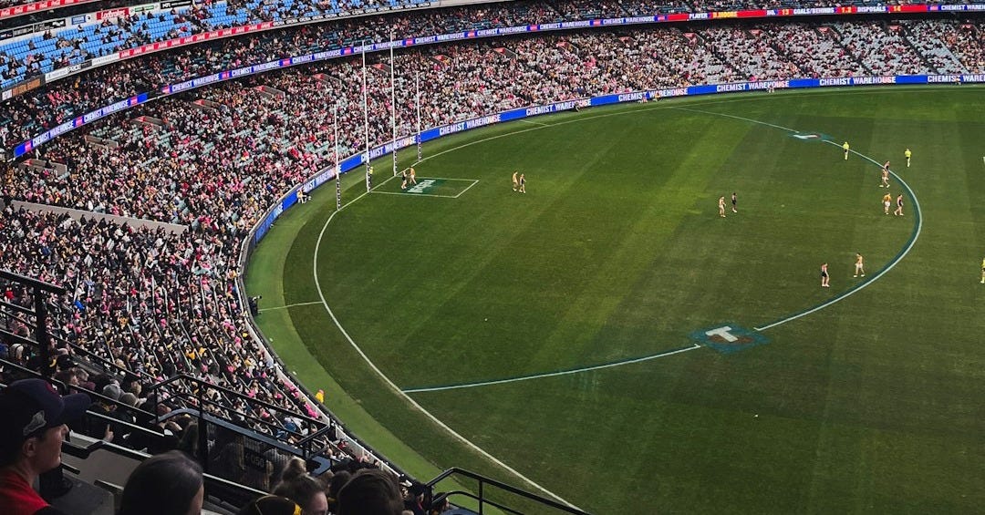 a large stadium filled with lots of people