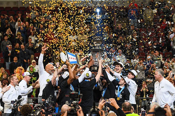 The Purdue Boilermakers celebrate with the Big Ten Tournament Championship trophy after beating the Michigan Wolverines in the Big Ten Men's...