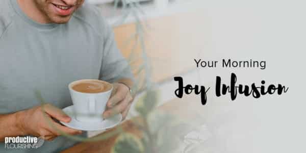 The bottom of a mans face, smiling as he holds a cup of coffee. Text overlay: Your Morning Joy Infusion
