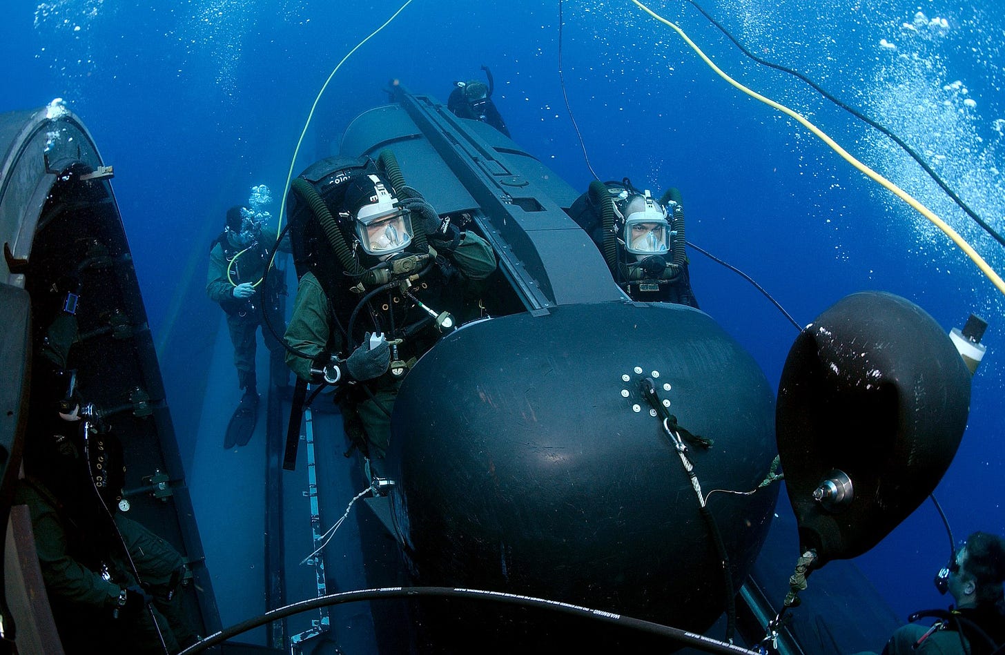 US Navy 050505-N-3093M-007 Members of SEAL Delivery Vehicle Team Two (SDVT-2) prepare to launch one of the team's SEAL Delivery Vehicles (SDV) from the back of the Los Angeles-class attack submarine USS Philadelphia (SSN 690).jpg