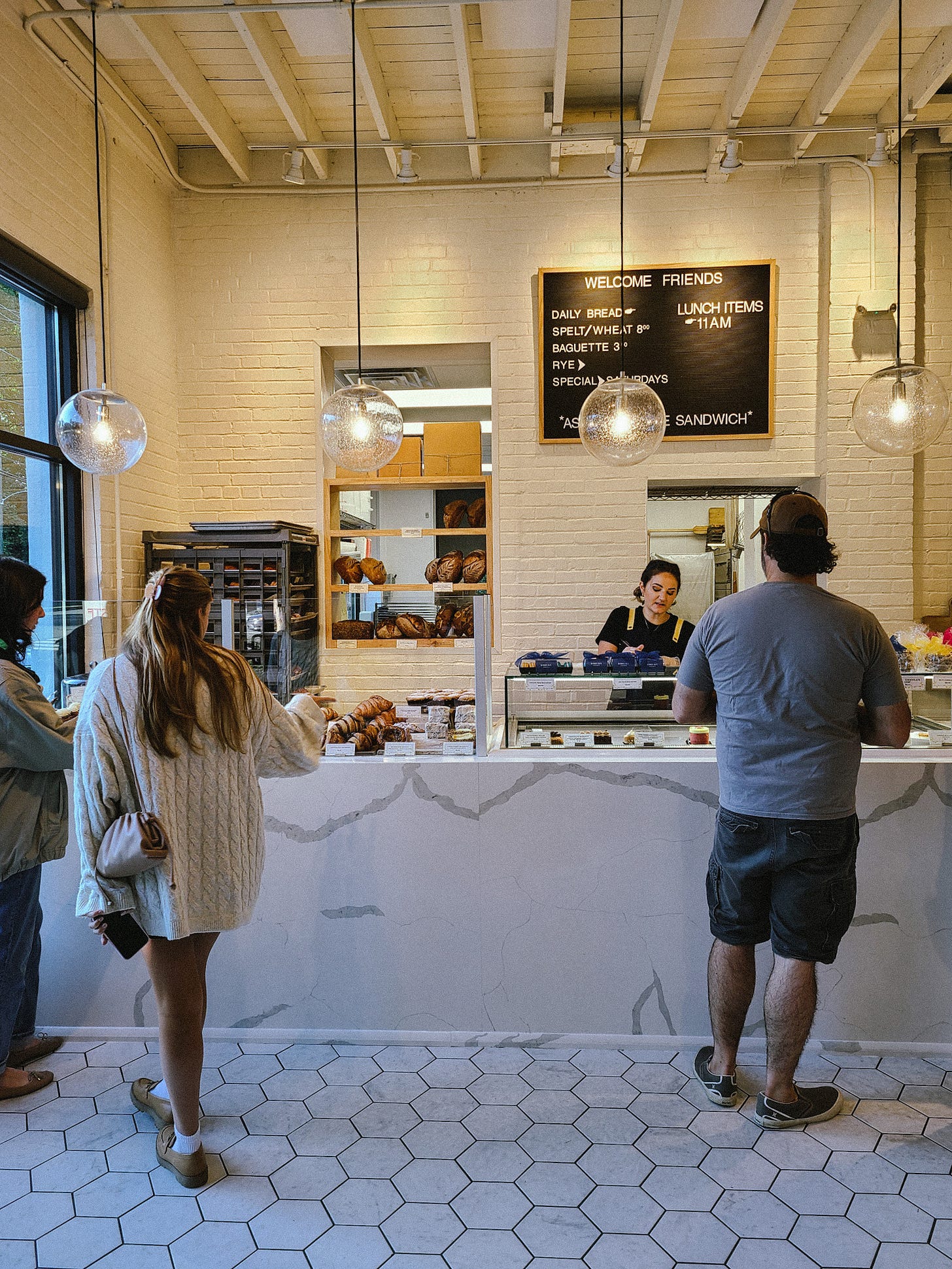 Bobby Boy Bakeshop interior pastry case, register