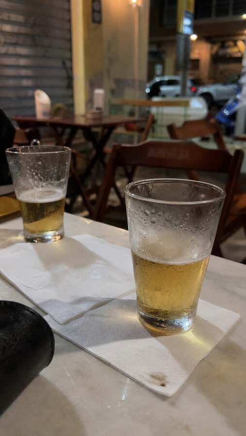Copinhos de cerveja on a bar table