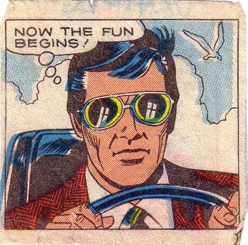 This may contain: an image of a man driving a car with sunglasses on