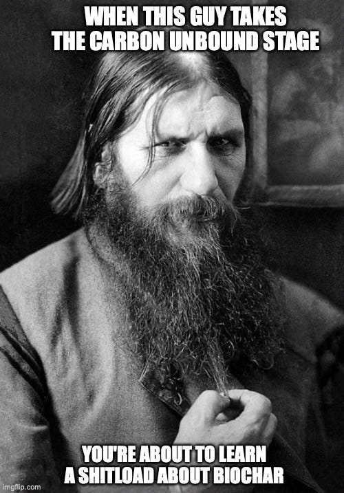 Black-and-white photograph of Grigori Rasputin with a long beard, staring intensely. Top text: "WHEN THIS GUY TAKES THE CARBON UNBOUND STAGE" Bottom text: "YOU'RE ABOUT TO LEARN A SHITLOAD ABOUT BIOCHAR"