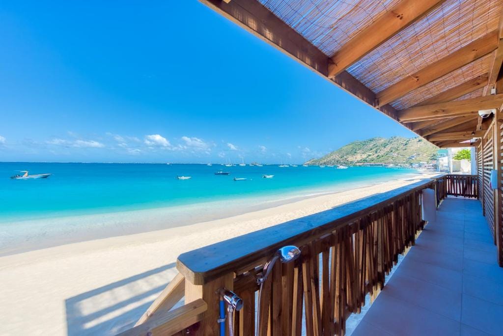 Oceanfront patios at Love Boutique-Hôtel, Grand Case