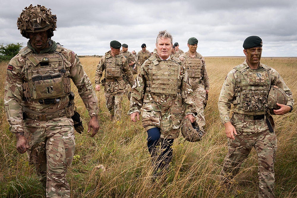 Photo shows Keir Starmer meeting British soldiers at Salisbury Plain in Wiltshire where he saw Ukranian soldiers being trained by the army as part of Operation Interflux