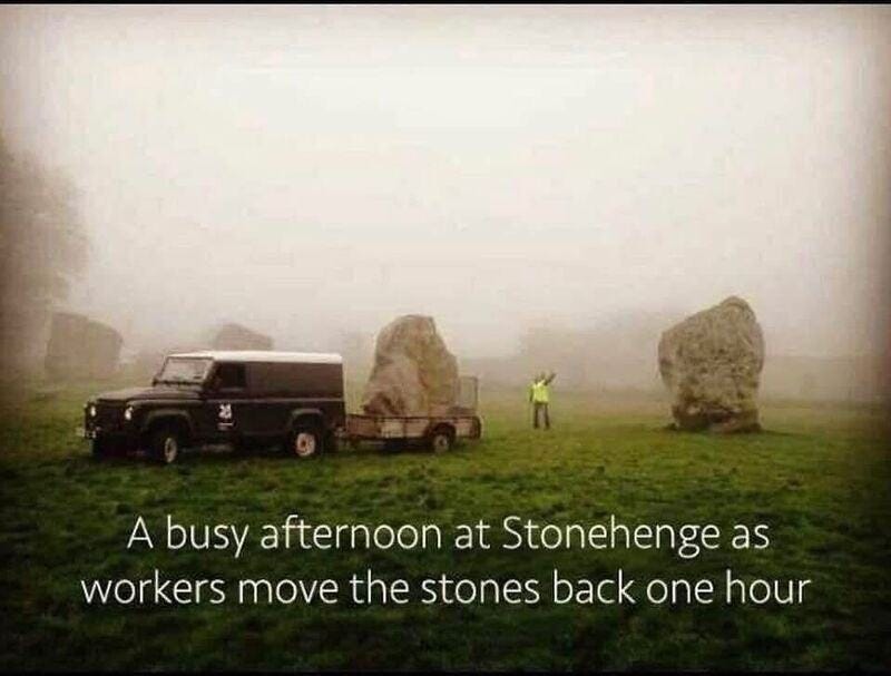 May be an image of Stone Henge and text that says 'A busy afternoon at at Stonehenge as as workers move the stones back one hour'