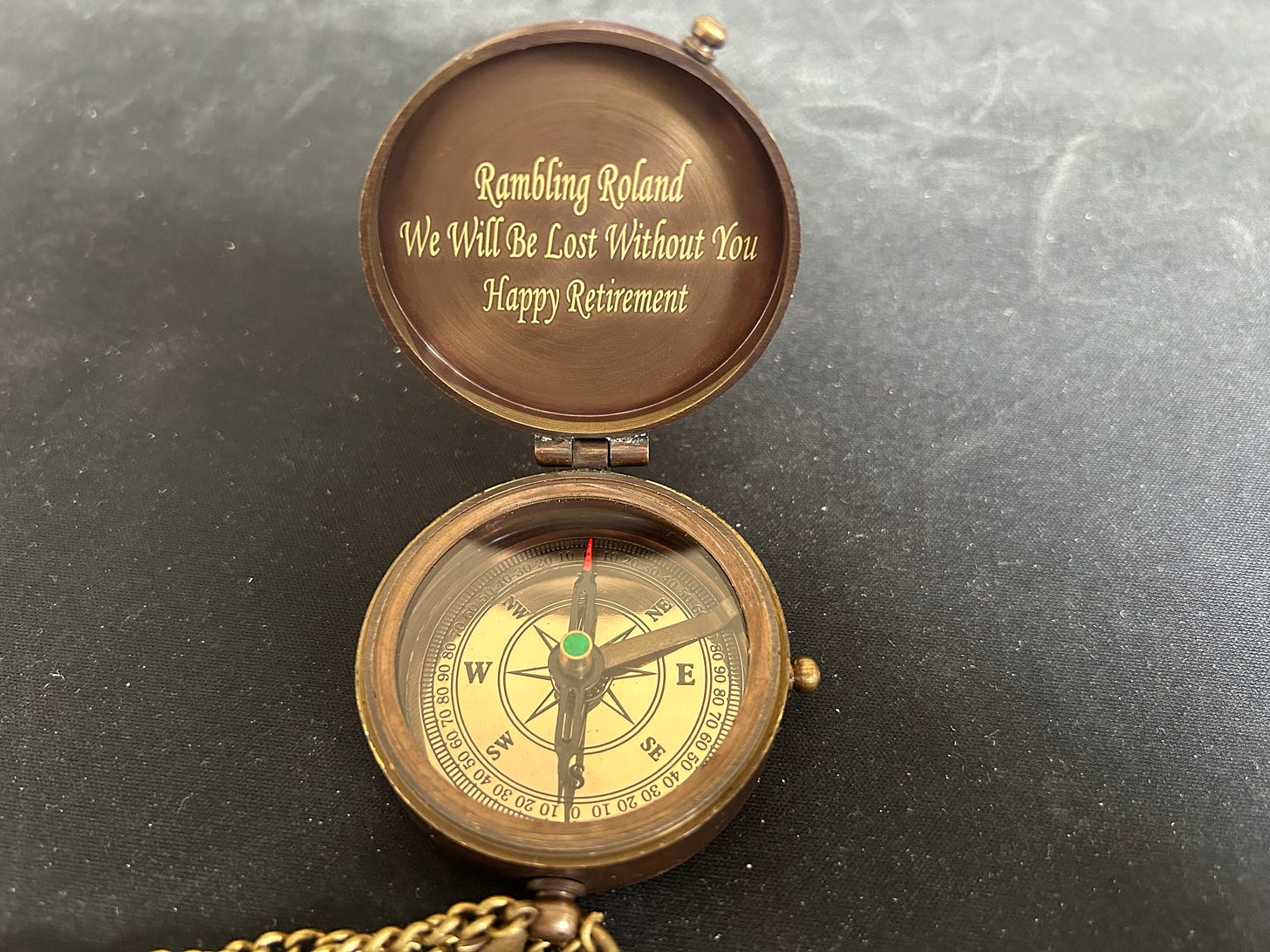 A magnetic compass in a case. A magnetic compass in a case.