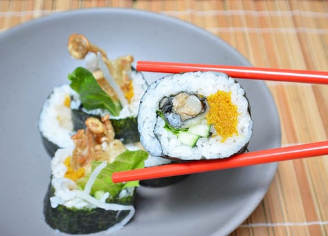 Vegan Tamago Futomaki: A thick slice of futomaki featuring a golden, plant-based tamago layer, wrapped in seasoned sushi rice and crisp nori. Crunchy Kimchi Futomaki: A bold, vibrant futomaki roll filled with spicy, crunchy kimchi. Mushroom ‘Spider’ Roll Futomaki: A plant-based take on the classic spider roll, featuring crispy, tempura-fried mushrooms as the star filling.