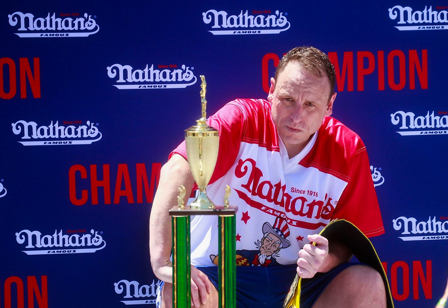 Hot dog eating champ Joey Chestnut barred from competing in this year's  contest | CNN Business