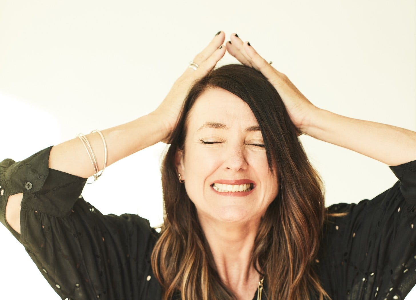 Natasha Silva-Jelly, former Vogue and Harper's Bazaar editor and editor of The New Front Row with her hands to her headin overwhelm — a mother on surviving her son's toxic relationship Natasha Silva-Jelly, former Vogue and Harper's Bazaar editor and editor of The New Front Row with her hands to her headin overwhelm — a mother on surviving her son's toxic relationship